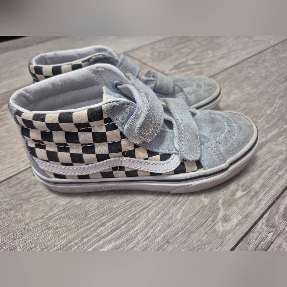 Vans Kids Sk8-Mid Reissue V shoes in a checkerboard and light blue colorway.